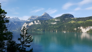 Emerald Reflections Where Mountains Embrace the Lake